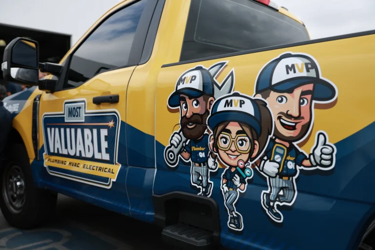 A yellow and blue truck with "Most Valuable Plumbing HVAC Electrical" branding, cartoon characters in uniforms and hats on the side door, highlights expert water softener installation services.