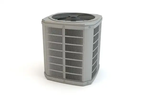 A gray, square-shaped outdoor air conditioning unit with a fan on top, set against a white background.