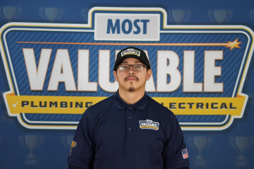 Meet the team: A man in a blue shirt.